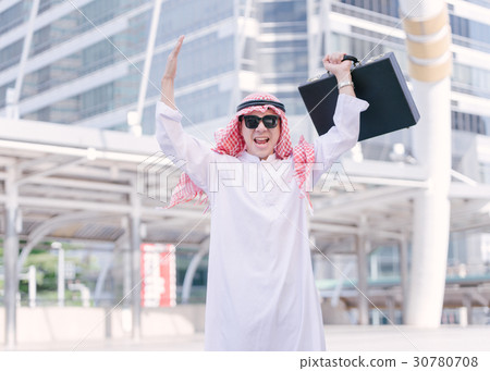 Successful Arabic businessman celebrating arm up 30780708