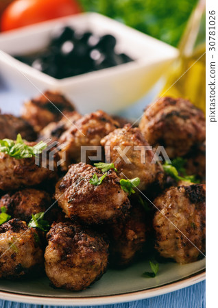 Greek meatballs (keftedes) with pita bread. 30781026