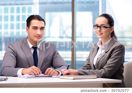 Businesspeople having discussion in the office Businesspeople having discussion in the office 30782077