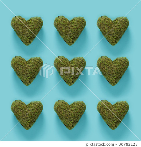 Series of green moss hearts on blue 30782125