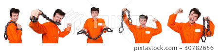 Young inmate with chains isolated on the white 30782656