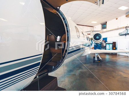 Private jet in a hangar Private jet in a hangar 30784568
