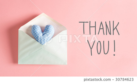 Thank You message with a blue heart cushion Thank You message with a blue heart cushion 30784623