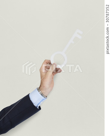 Business Man Holding Key Business Man Holding Key 30787352