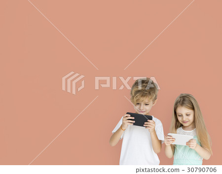 Young Kids Playing Mobile Phone 30790706