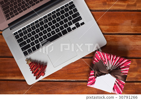 Laptop on christmas evening Laptop on christmas evening 30791266