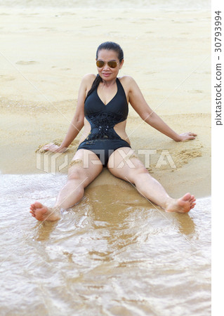Lady relax on sand Lady relax on sand 30793994