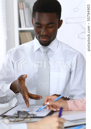 African american businessman at meeting in office African american businessman at meeting in office 30794905