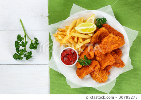 delicious chicken nuggets with tomato sauce delicious chicken nuggets with tomato sauce 30795275