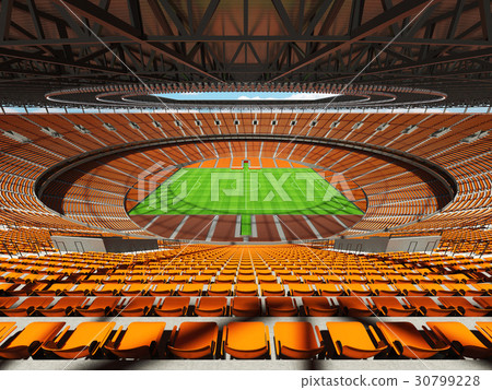 Round football soccer stadium with  orange seats 30799228