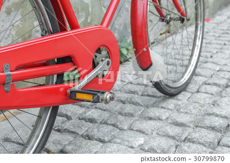 Red bicycle vintage antique in city Red bicycle vintage antique in city 30799870