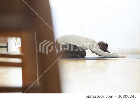asian lady practising yoga in the morning asian lady practising yoga in the morning 30800245