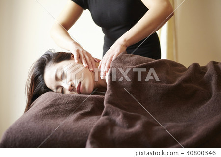 A woman is massaged neck in spa. A woman is massaged neck in spa. 30800346