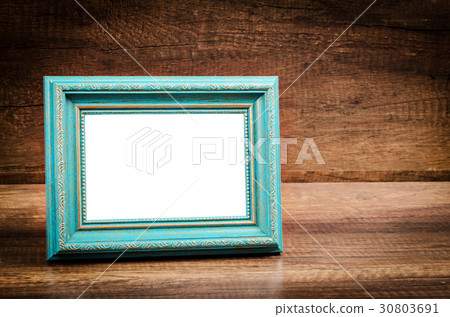 Blue blank photo frame on wooden room. Blue blank photo frame on wooden room. 30803691