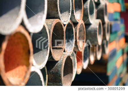 Multi color scaffolding pipe row on shelve  30805209