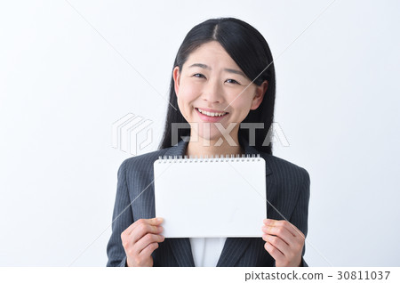A young woman with a suit with a whiteboard 30811037
