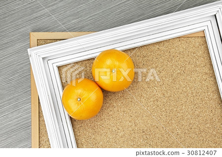 Orange on white wooden frame, Healthy food eating 30812407
