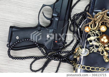Woman bag with gun hidden, Handgun and accessories 30813715