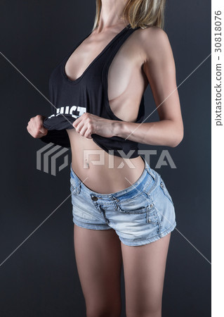 Blond woman wearing shirt with sexual shape 30818076