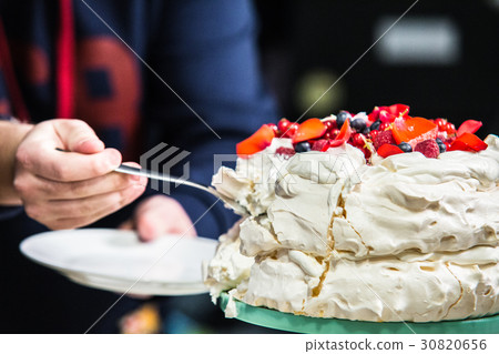 Cake Pavlova with cream and fresh fruits Cake Pavlova with cream and fresh fruits 30820656