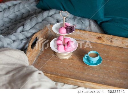 photo of stand with marshmallows and branch 30822341