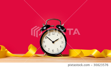 alarm clock and ribbon 30823576