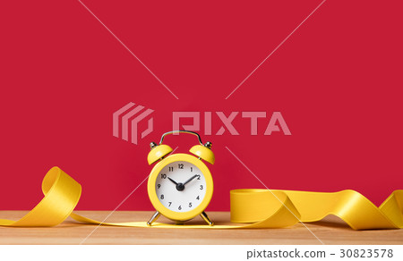 alarm clock and ribbon 30823578