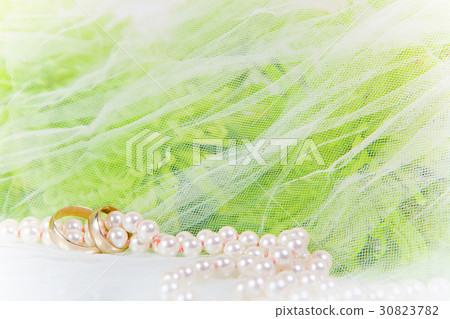 necklace of pearls, wedding rings and bouquet necklace of pearls, wedding rings and bouquet 30823782