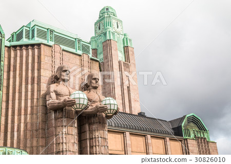 Giant statues in Helsinki Central station 30826010