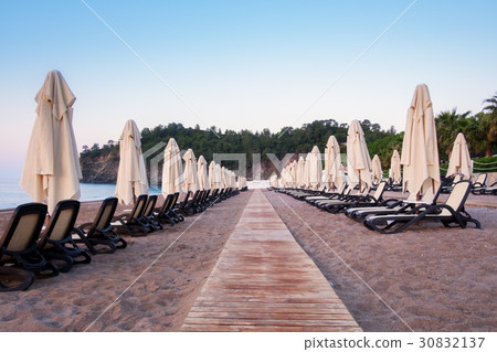 Sunshade umbrella on sea beach 30832137