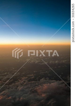 Sunset or sunrise viewed from airplane Sunset or sunrise viewed from airplane 30834265