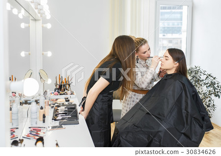visagiste applying makeup visagiste applying makeup 30834626