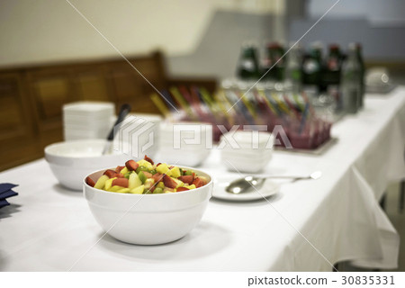 Closeup dessert on buffet table with fresh fruits Closeup dessert on buffet table with fresh fruits 30835331