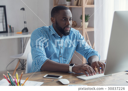Young african man working in the office business 30837226