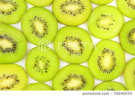 slices of fresh green kiwi fruits food background 30840059