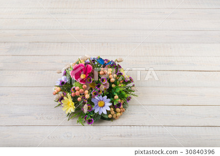 Composition made of artificial flowers, fruits, butterflies, birds and ears of wheat. 30840396