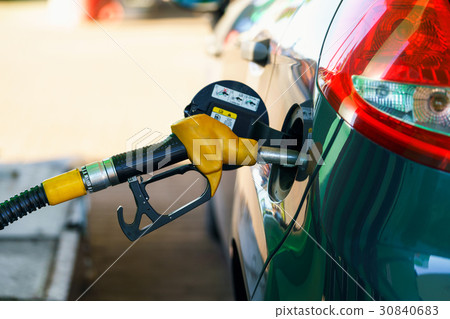 Car refueling on a petrol station Car refueling on a petrol station 30840683