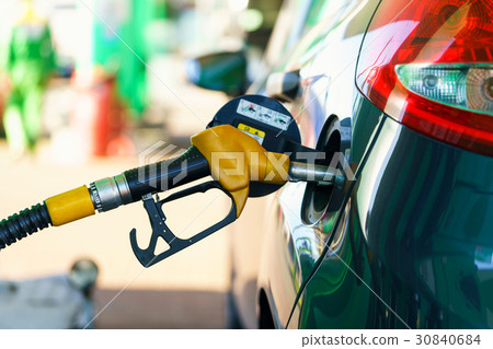 Car refueling on a petrol station 30840684