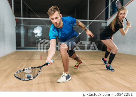 Squash game training, players with rackets 30842291