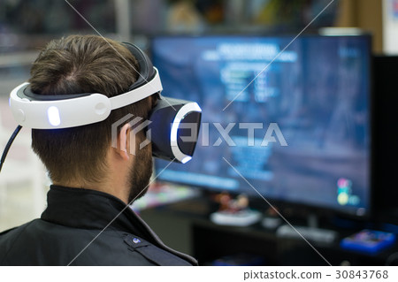 man in VR headset who enjoyng game. Virtual realit 30843768