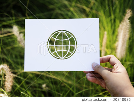 Hand Hold Globe Paper Carving with Grass Background Hand Hold Globe Paper Carving with Grass Background 30848985