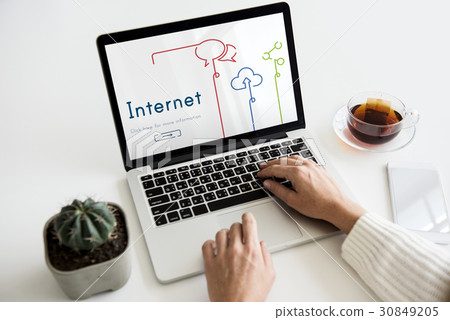Hands working on laptop network graphic overlay Hands working on laptop network graphic overlay 30849205