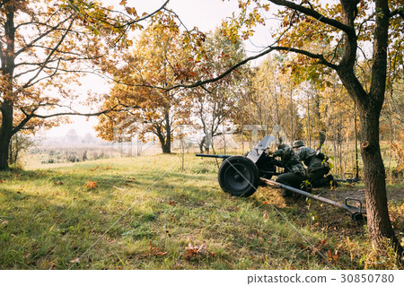Re-enactors Dressed As German Wehrmacht Infantry Re-enactors Dressed As German Wehrmacht Infantry 30850780