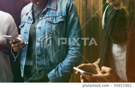 Group of friends share networking with smart phone 30851861