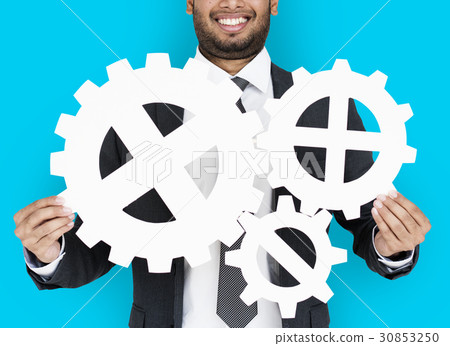 Businessman Smiling Happiness Holding Gear Symbol Concept Businessman Smiling Happiness Holding Gear Symbol Concept 30853250