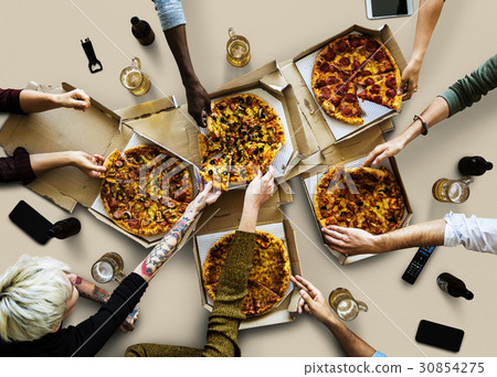 Group of poeple enjoy the italian cuisine pizza Group of poeple enjoy the italian cuisine pizza 30854275