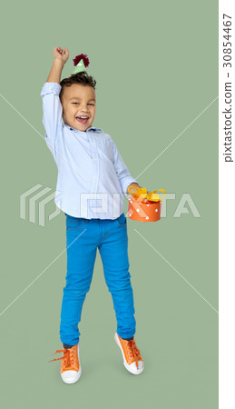 Little Boy with Gift Party Hat Studio Portrait 30854467