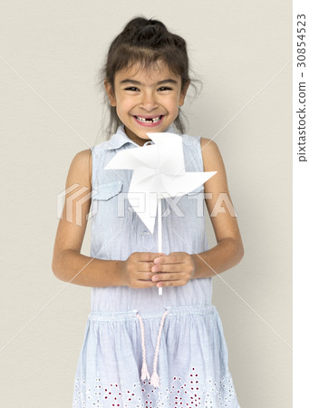 Little Girl Hands Holding Paper Wind Mill Studio Portrait Little Girl Hands Holding Paper Wind Mill Studio Portrait 30854523