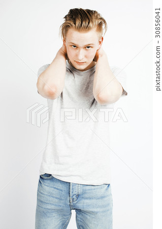 young handsome teenage hipster guy posing 30856041