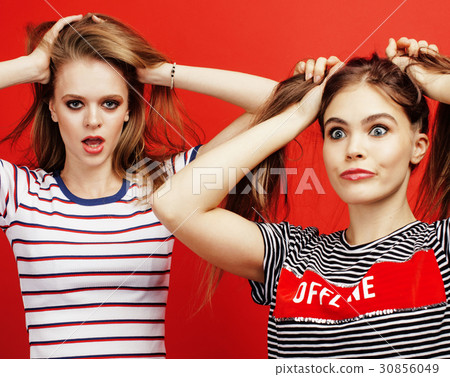 two best friends teenage girls together having fun two best friends teenage girls together having fun 30856049